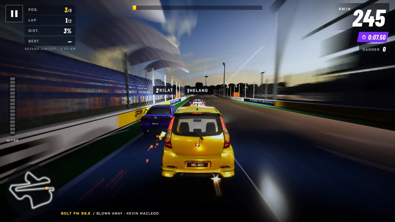 Down the main straight at Sepang: your yellow King with Kilat's Positron Warrior alongside, the grandstand on the left